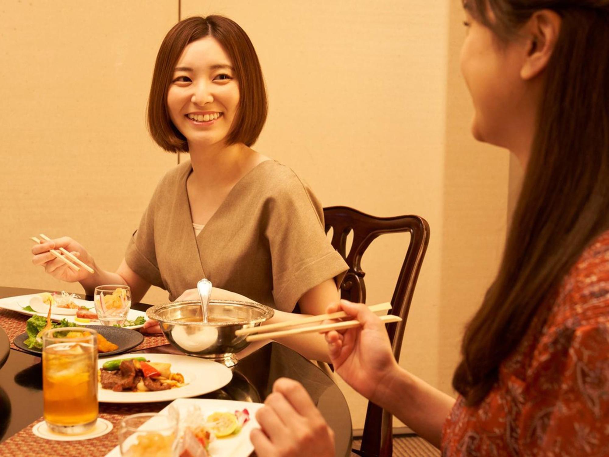 Sapporo Prince Hotel Exterior photo Japanese women eating with chopsticks